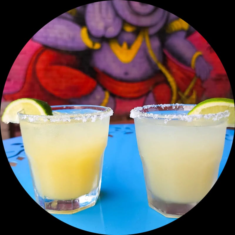 Margaritas against the mural